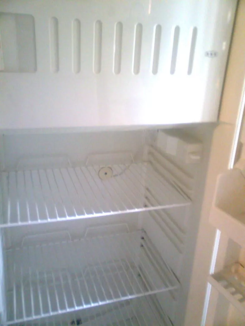 Холодильник Cтинол высокий